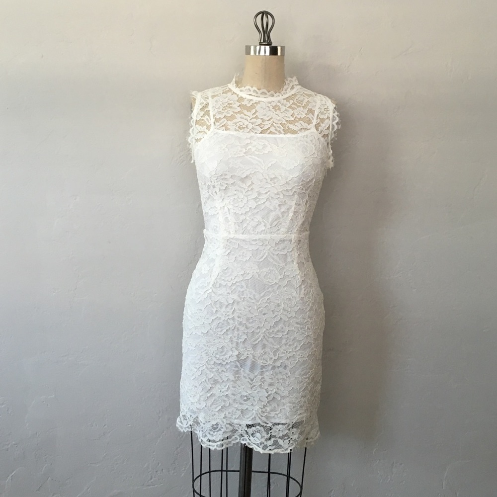 Ivory lace dress with built in slip and silk bows